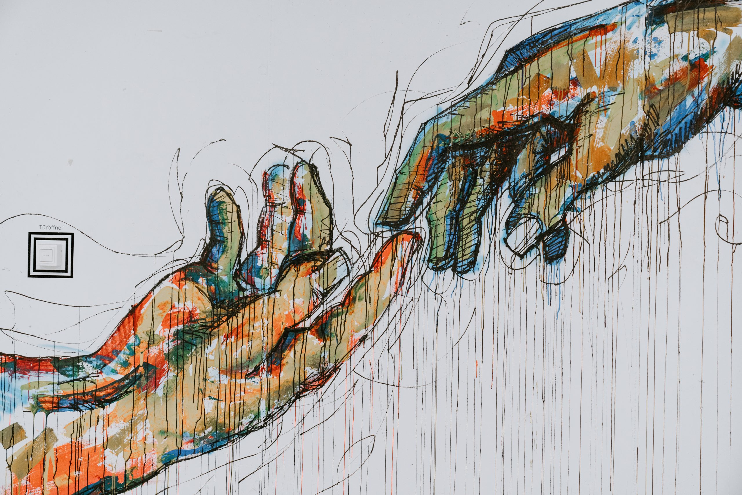 A computer generated color sketch of two hands reaching out for the other, their index fingers barely touching.